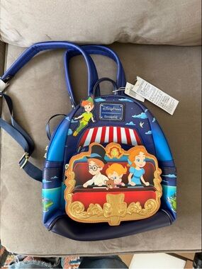 Loungefly Blue Peter Pan Jolly Roger Mini Backpack with Multicolor Accents